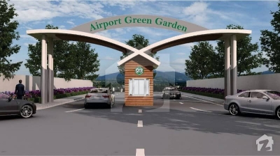 10 marla plot is available for sale in airport green garden