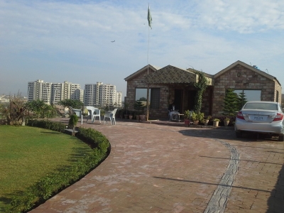 24 kanal Farm House for sale on Park Road Islamabad.